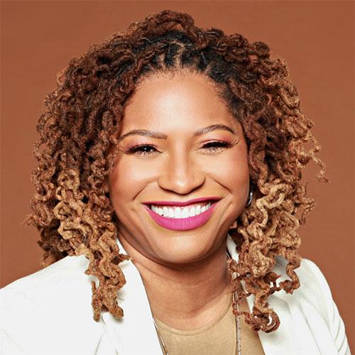 Headshot of Dr. Akilah Watkins, President and CEO, Independent Sector, in a white jacket.
