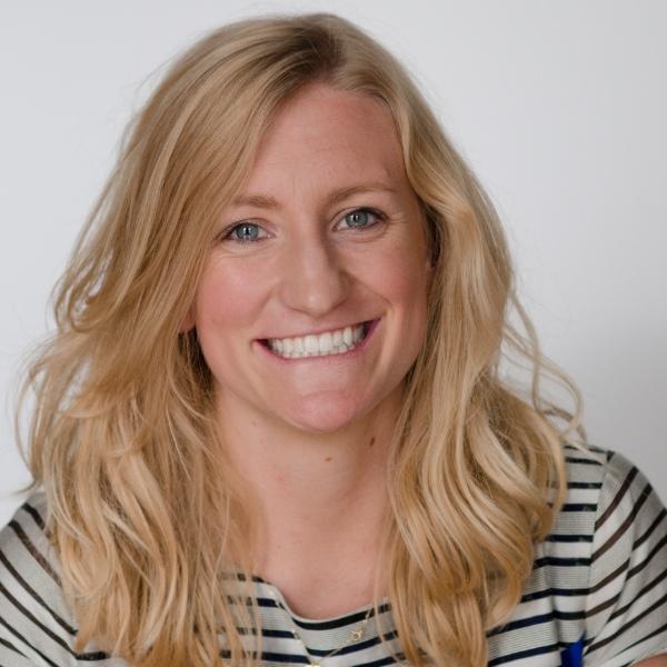 Headshot of Abby Ross, CEO of Network for Good, in a striped top.