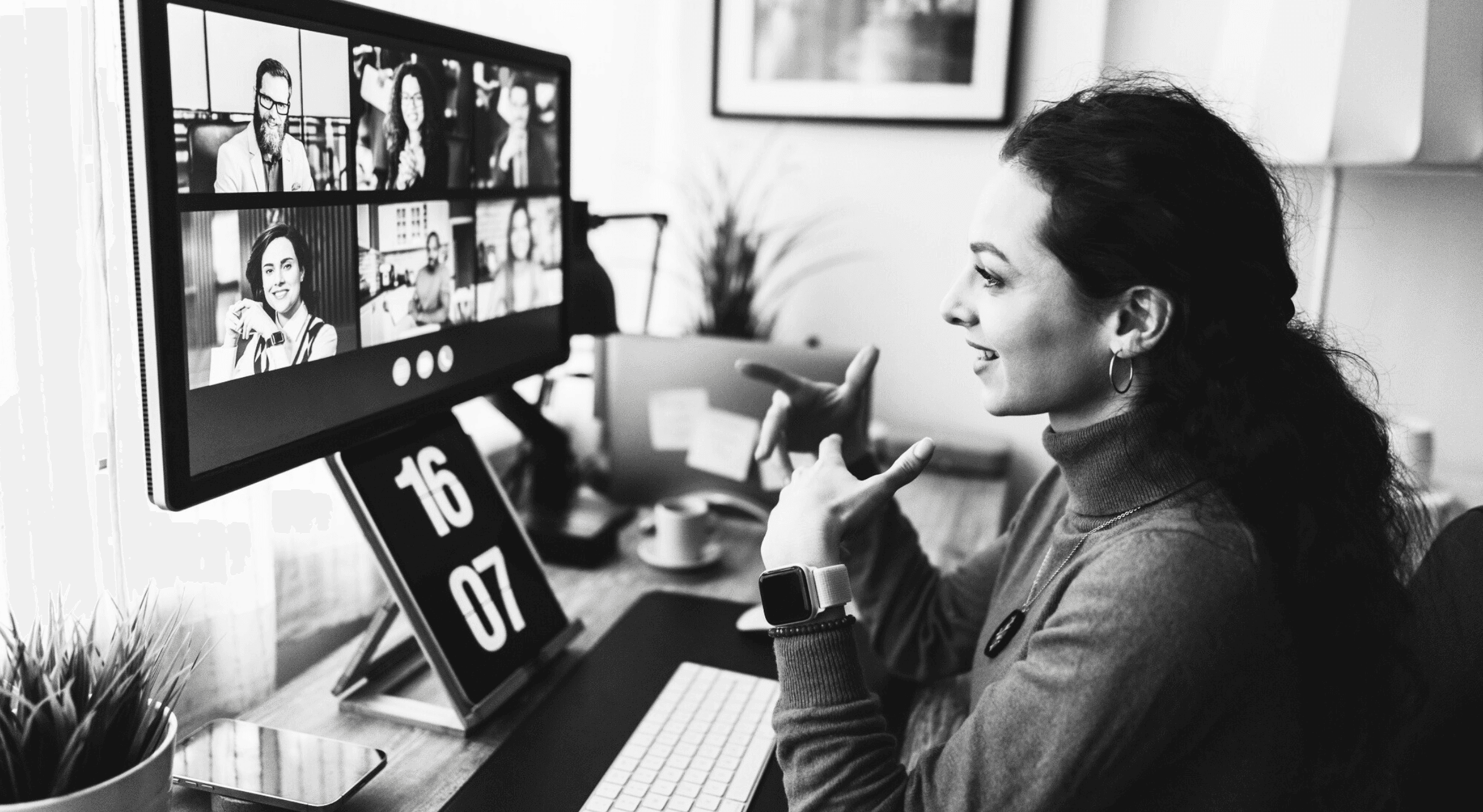 A woman on a virtual team meeting.